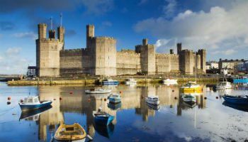 Caernarfon castle is a historic site dominating the town of Caernarfon