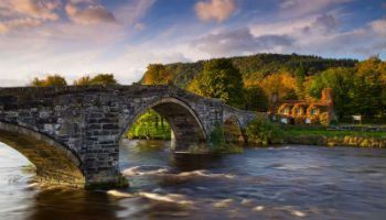 17th century Pont Fawr stone bridge on the river Conwy.