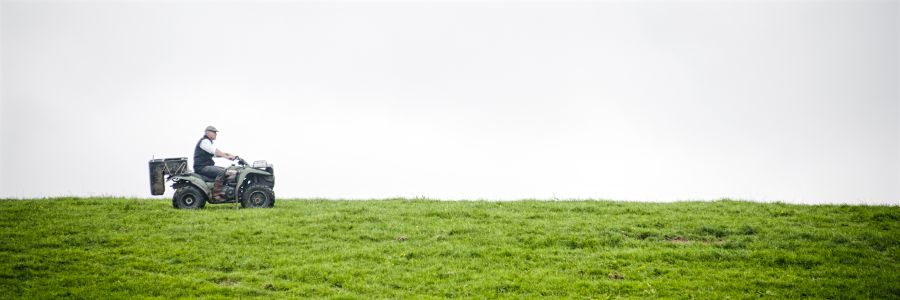 A farmer riding his quad on one of our Dairy Tours of Ireland